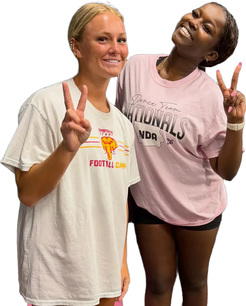Two teen athletes smiling and throwing peace signs